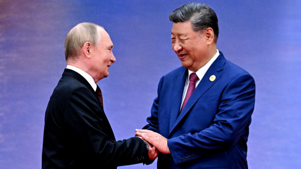Путин и Си Цзиньпин поговорили перед саммитом ШОС